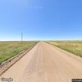 Traffic stop on maroon Toyota on Weld County Road 49