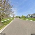 Small box on fire near bike path in North Aurora