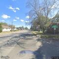 Female driver actively miscarrying at intersection