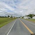 Reckless passing by maroon Ford sedan on Route 1