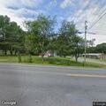 Two-car crash with fluid leak on Lisbon Road