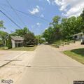 Traffic stop on maroon Ford sedan