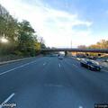 Stopped vehicle blocking left lane on I-395 north