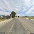 Small grass fire in wash near Avenue J8