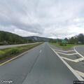 Jackknifed tractor-trailer leaves debris on highway