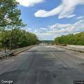 Debris falling from dump truck on Route 2 westbound