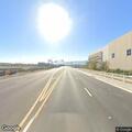 Big rig on shoulder with debris in traffic lane