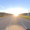 Woman walking on highway yelling for help