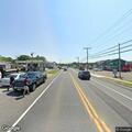 Vehicle crashes into building on New Road