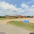 Person reporting chest pain at high school building