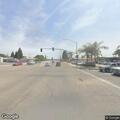 Man running in roadway and growling at vehicles