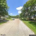Man in dark clothes lunges at vehicle near Smythe Ct