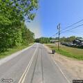 Dump truck pulls down telephone poles on Intervale Road