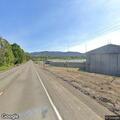 Passenger reports intoxicated driver in white truck