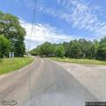 Vehicle hits utility pole and drags power line