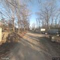 Bullets reportedly damaged a carport near Fernandez Lane