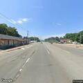 Dead deer creating road hazard near Main Street