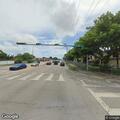 Officer checks gray Honda at Flagler shopping center