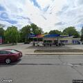 Vehicle smoking at gas station parking lot