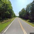 Person behaving erratically lying on roadway in Plymouth