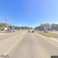 Officer checks person at Fort Rucker gate
