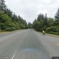 Stopped vehicle on US-101 shoulder near Lighthouse