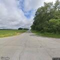Rollover crash with possible ejection in cornfield