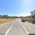 Vehicle over embankment near Highway 299