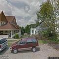 Man reported with handgun in front yard