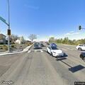 Disabled vehicle blocking traffic at intersection