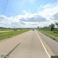 Report of black SUV leaving road near mile 48.5