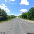 Car hits bear and leaves roadway on Highway 169