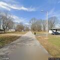 Police dog track through neighborhood streets