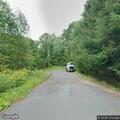 Rocks creating road hazard on Goodrich Lane
