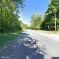 Car crash with entrapped driver on VT-132 riverbank