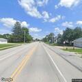 Semi loading equipment blocks traffic on Highway 130