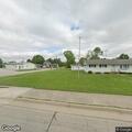 Person camping under pavilion at Fairview Park