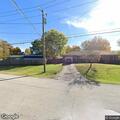 Intoxicated woman stumbling in roadway