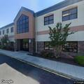 Person suffering chest pain at therapy center