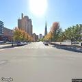 Person lying on ground at East Washington and Montgomery