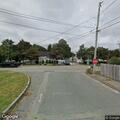 Truck tangled in downed wires closes Washington Street