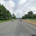 Crash investigation involving black Mazda on WA-512