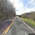 Car hits guardrail on Gravely Highway