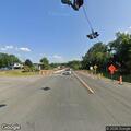 Roadway debris and vehicle block Route 14 near garage