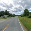 Deceased deer causing road hazard on Route 120