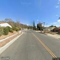 Driver under the influence in black SUV on Main Street