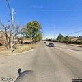Officer directs traffic at malfunctioning signal