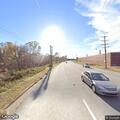 Dump truck overturns at Morganton Boulevard intersection