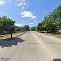 Garbage can creating road hazard on Highway 172