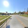 Person having anxiety attack driving white Chevy van